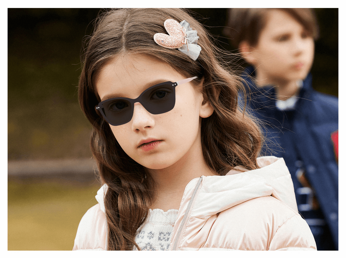 child model, a little girl, clip-on, square glasses frame,pink temple, outdoor