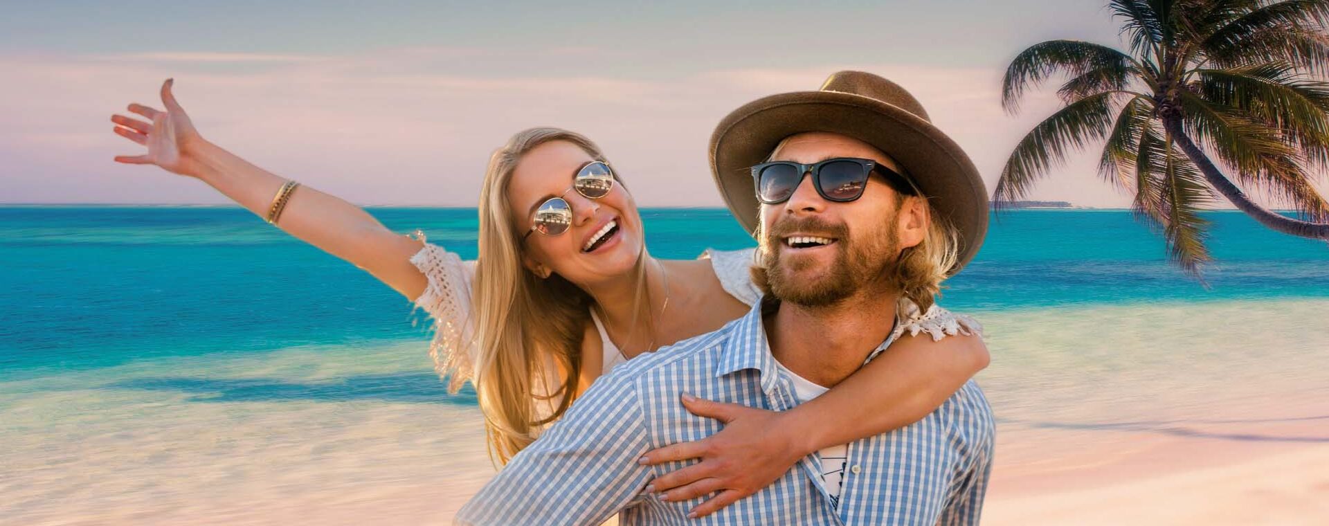 A couple with sunglasses on the beach